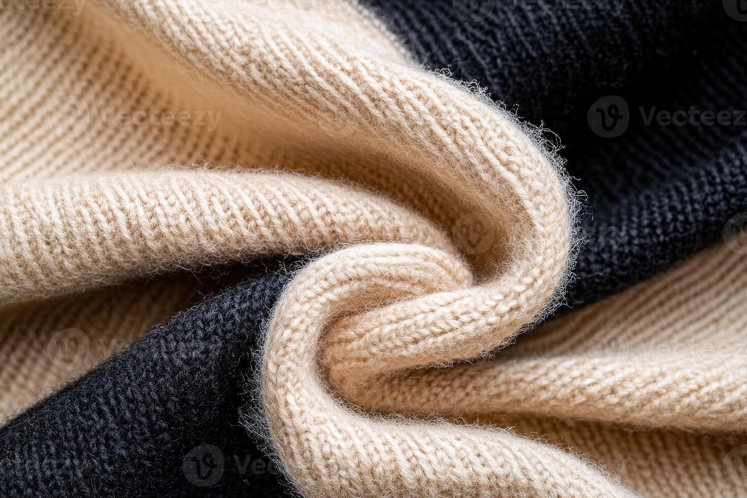 A soft wool surface features a gradient transition from beige to deep black, creating a sophisticated design element perfect for contemporary textiles. The elegant tones blend seamlessly photo