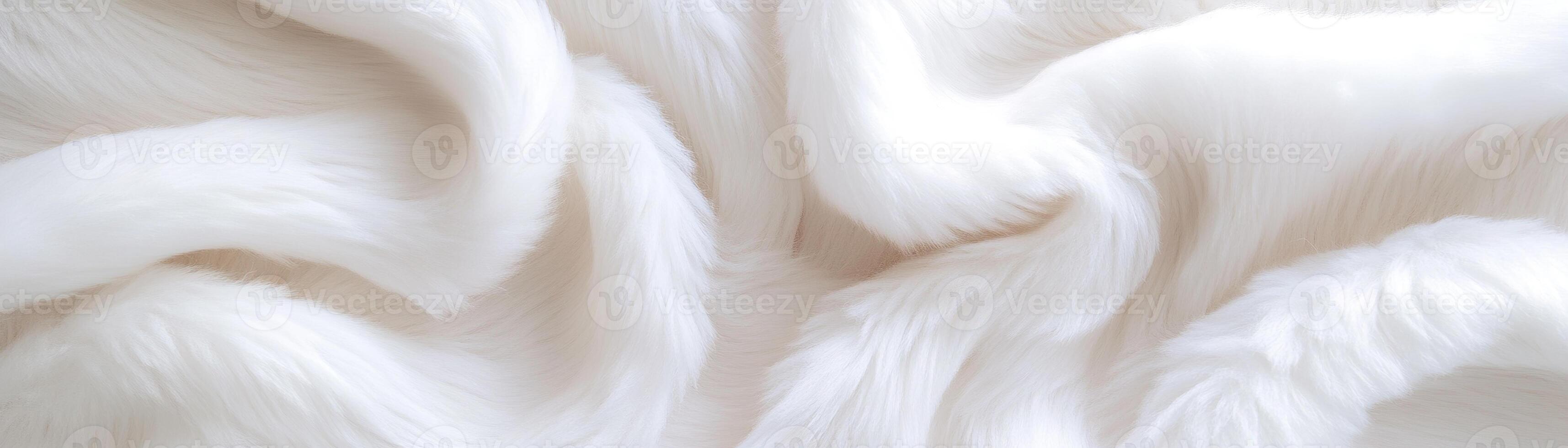 A plush white faux fur background features delicate wavy textures illuminated softly, creating an airy atmosphere perfect for aesthetic settings or product displays photo