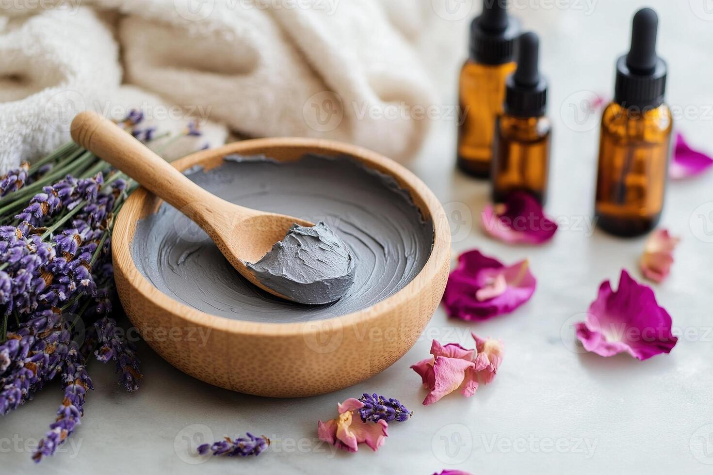 Beautifully arranged spa still life features a clay mask in a wooden bowl, surrounded by dried lavender, rose petals, and essential oil bottles, evoking a sense of luxury and relaxation photo