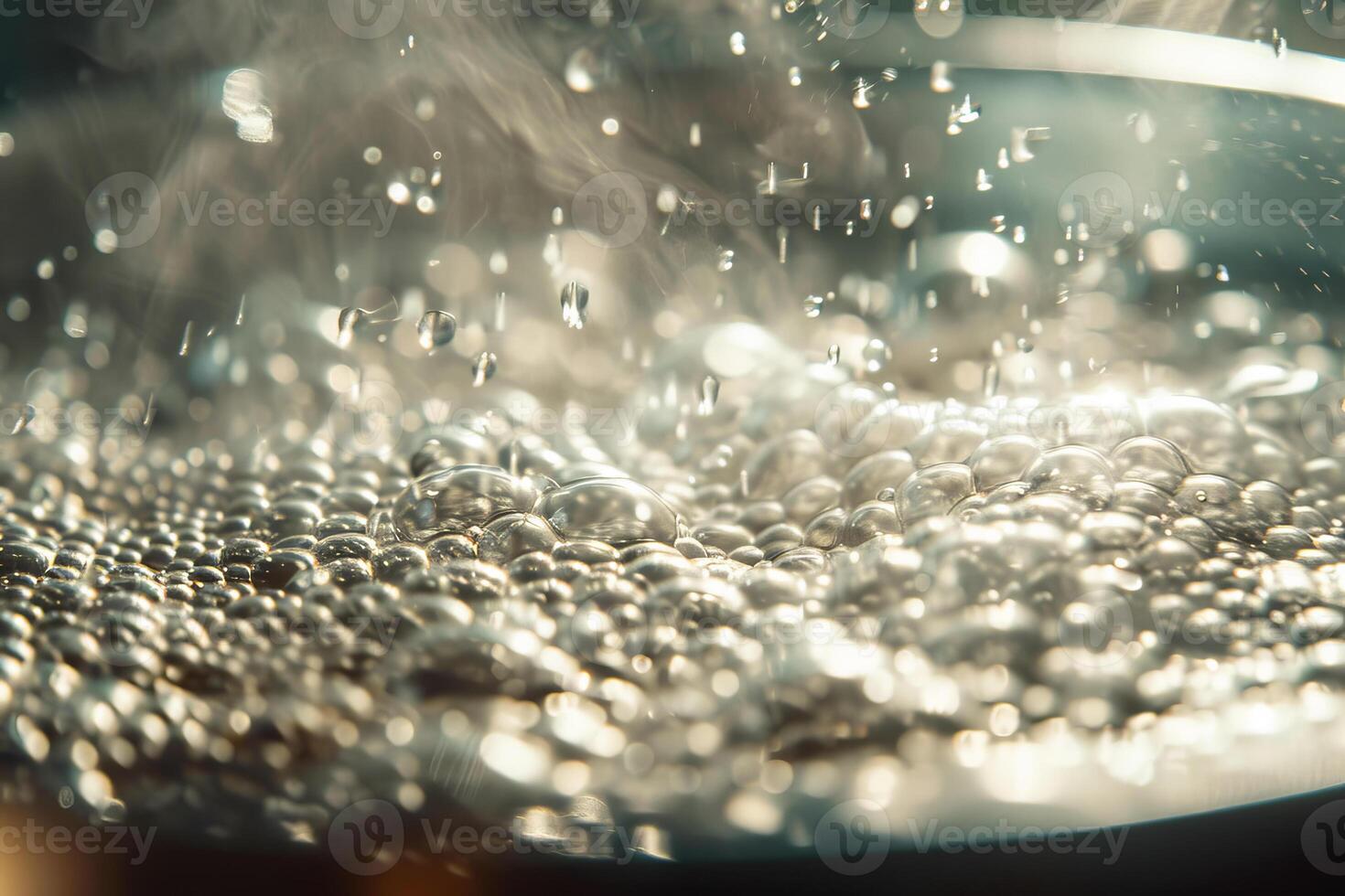 A pot of water boiling with steam rising from it photo