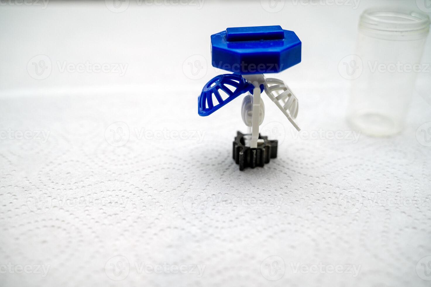 container for cleaning and storing contact lenses for eyes, used at home. For soft and hard lenses. the container consists of two parts, the first one for lenses, open, the second part for liquid photo