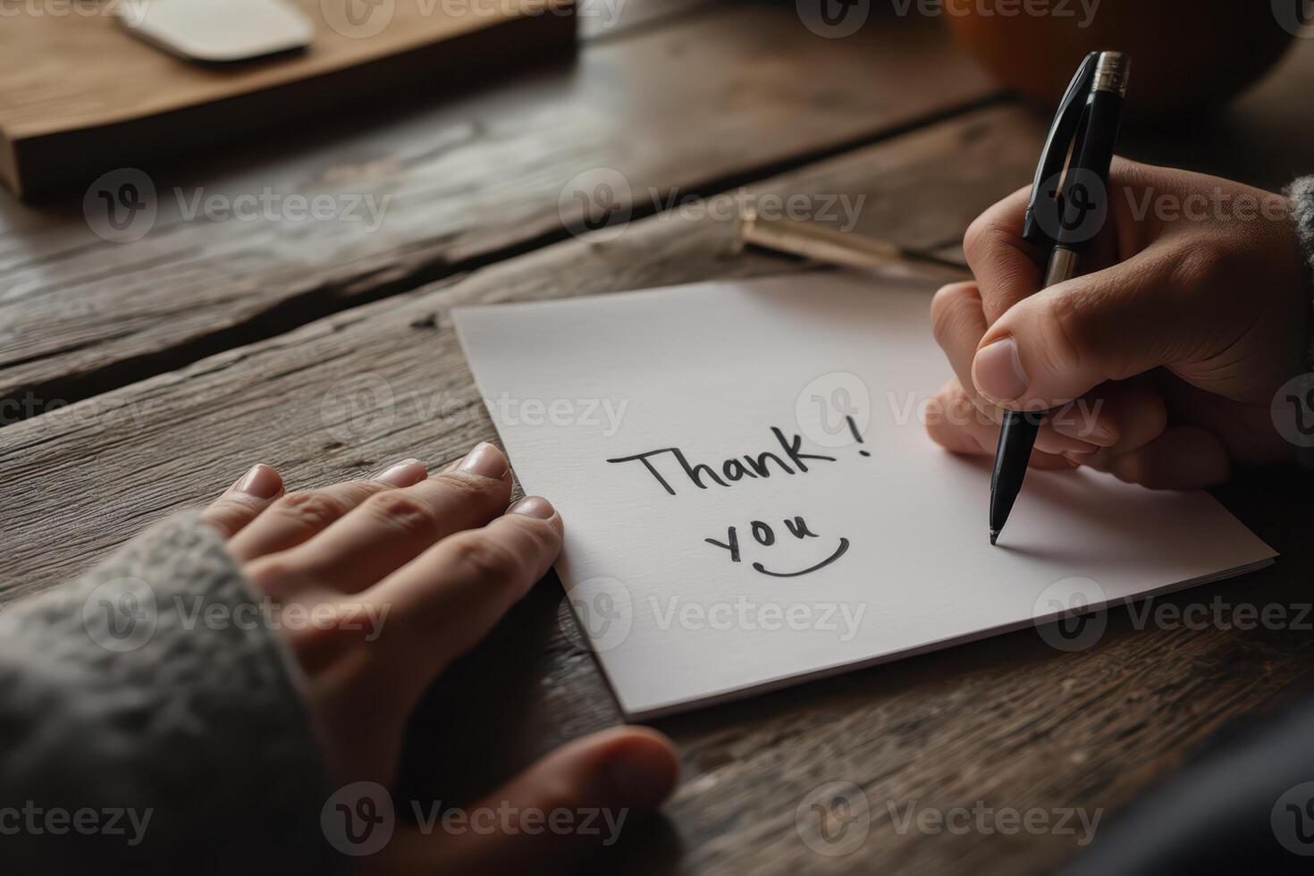 thank you note on a wooden table photo