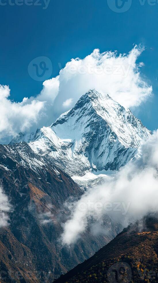 A Grand Snow-Covered Mountain Summit Beneath a Striking Sky photo