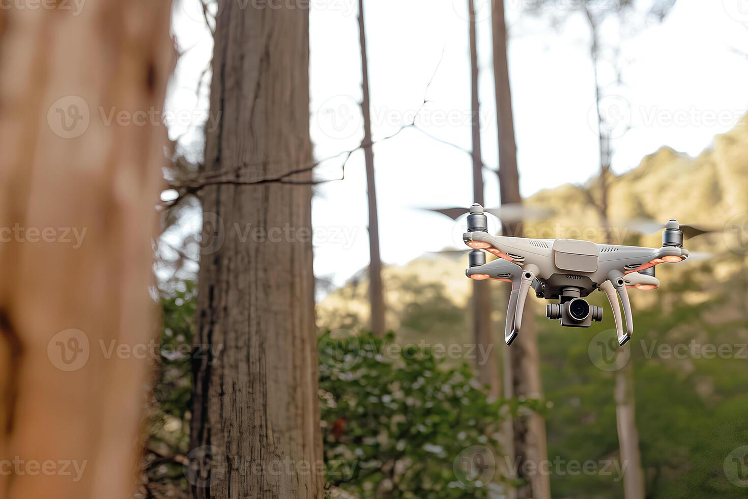 A drone equipped with a digital camera soaring over a lush forest, capturing breathtaking aerial views of the natural landscape. The scene highlights the powerful technology and stunning environment photo