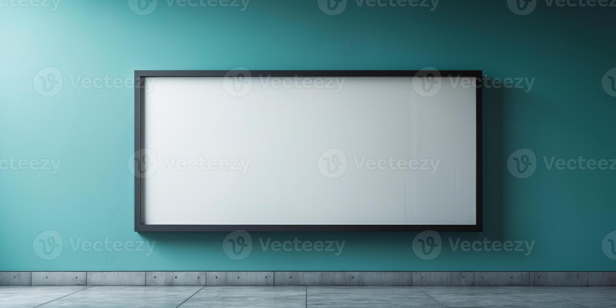 Empty billboard providing advertising space on a teal wall with gray floor photo