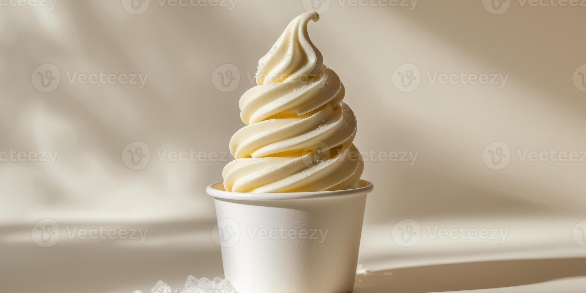 Close up of vanilla soft serve ice cream in a cup. photo