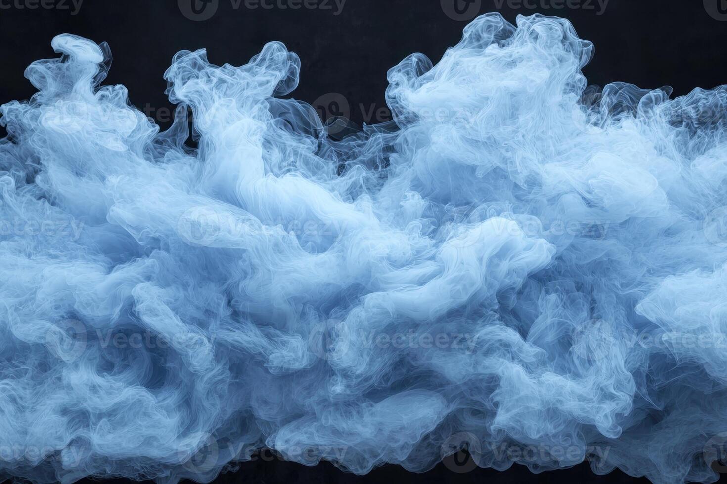 Abstract blue smoke on a dark background photo