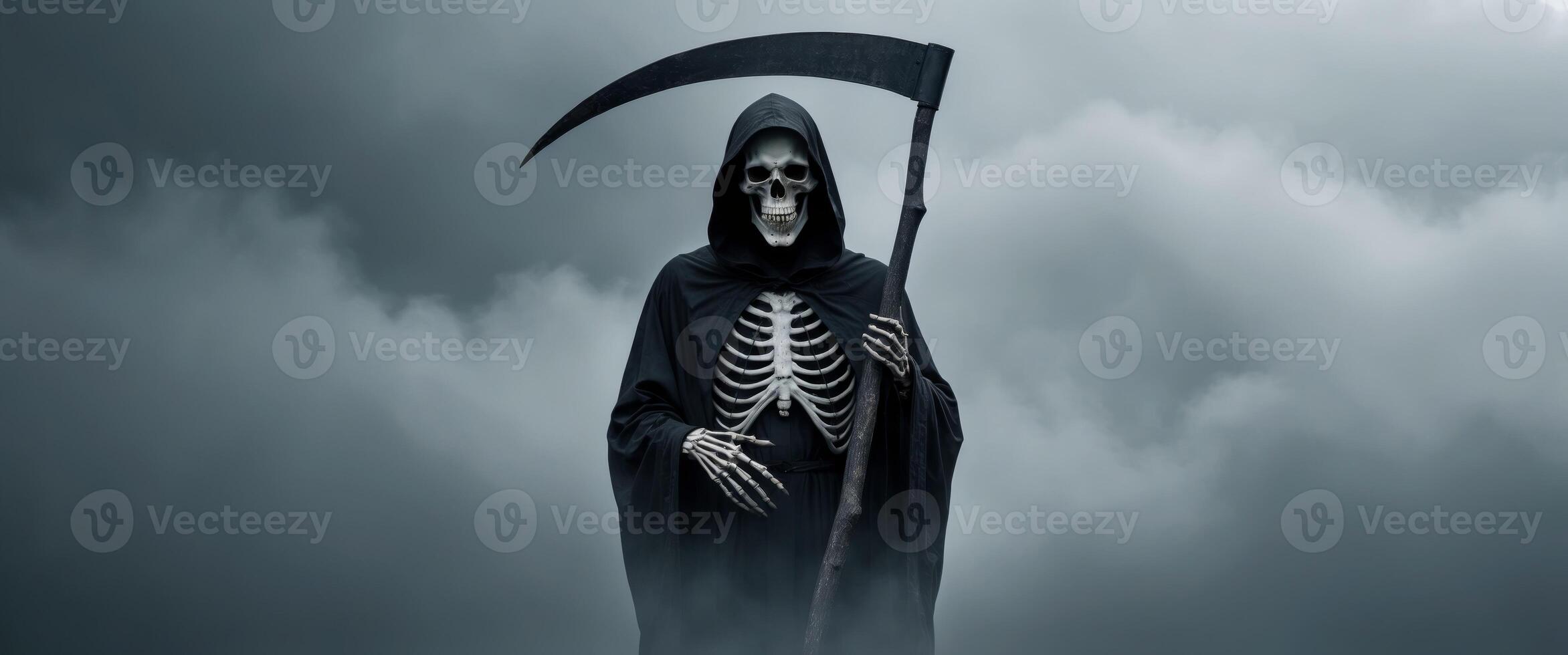 Silhouette of Grim Reaper over dark gray background with copy space. photo