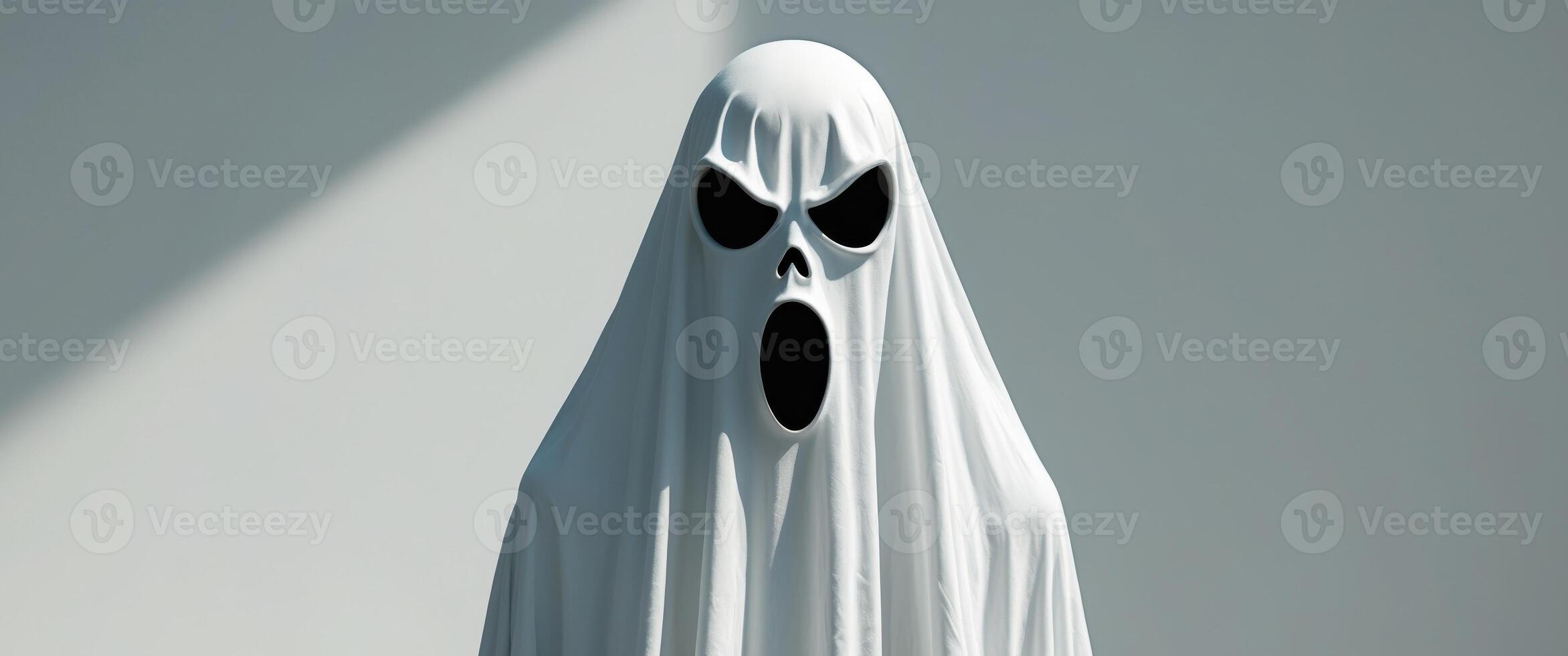A ghostly white ghost with black eyes photo
