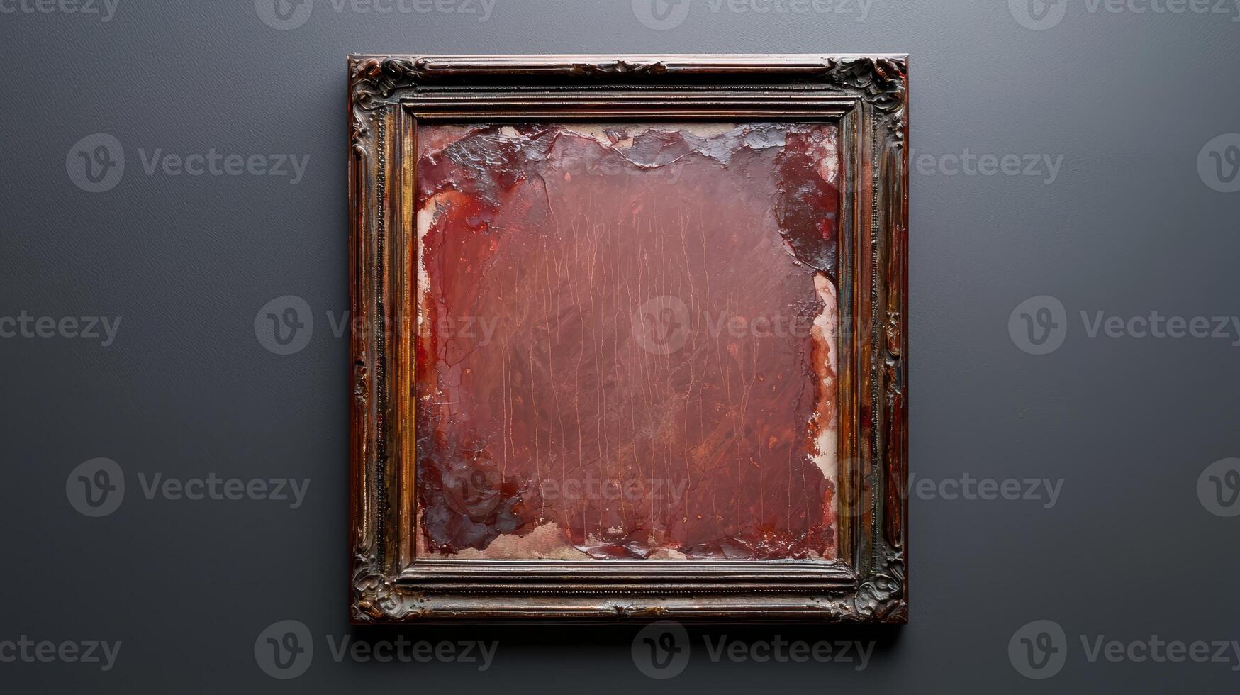 Abstract painting with a vintage frame on a dark wall photo