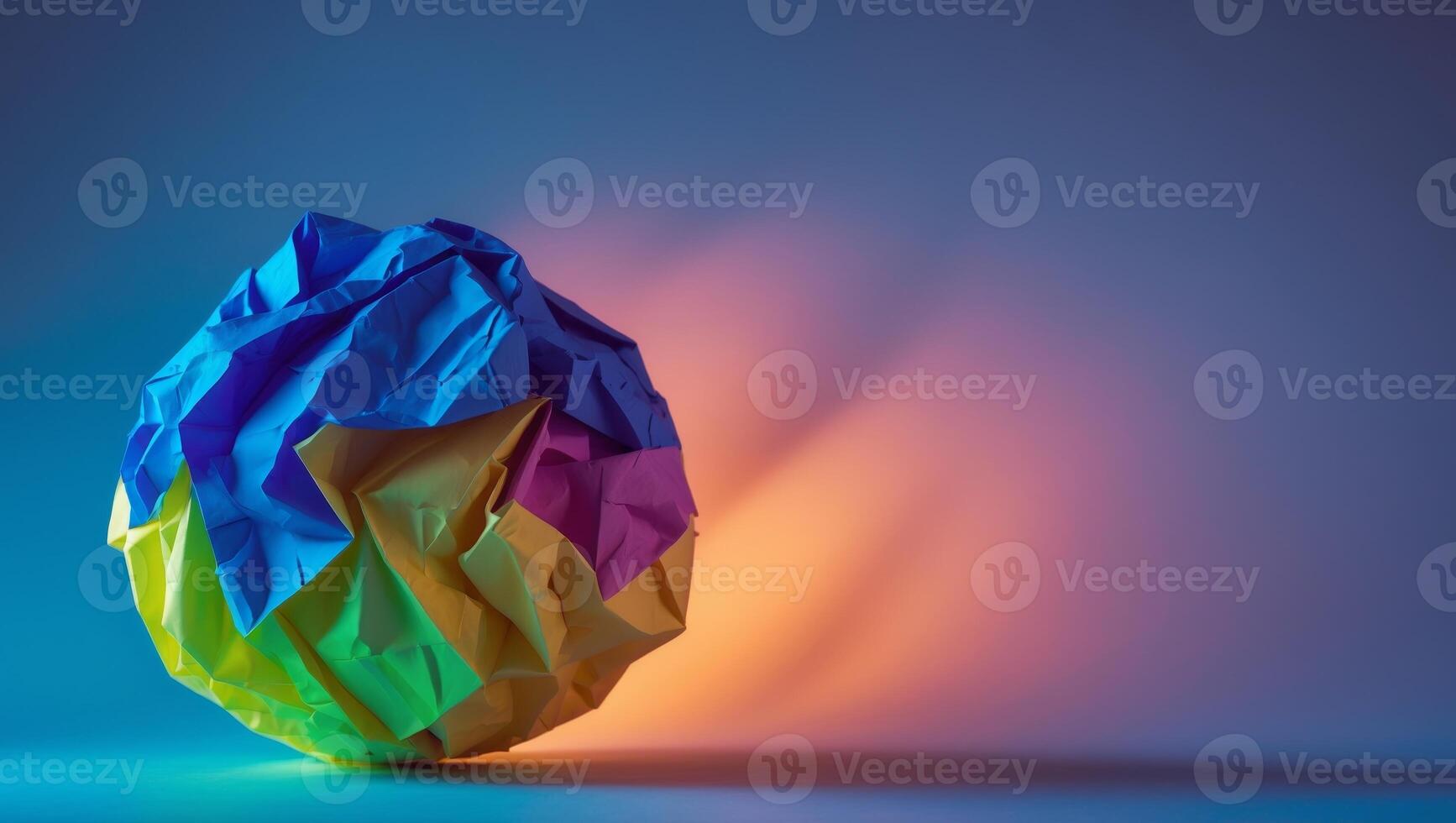 Colorful Paper Ball on Vibrant Background with Dynamic Light Play. photo