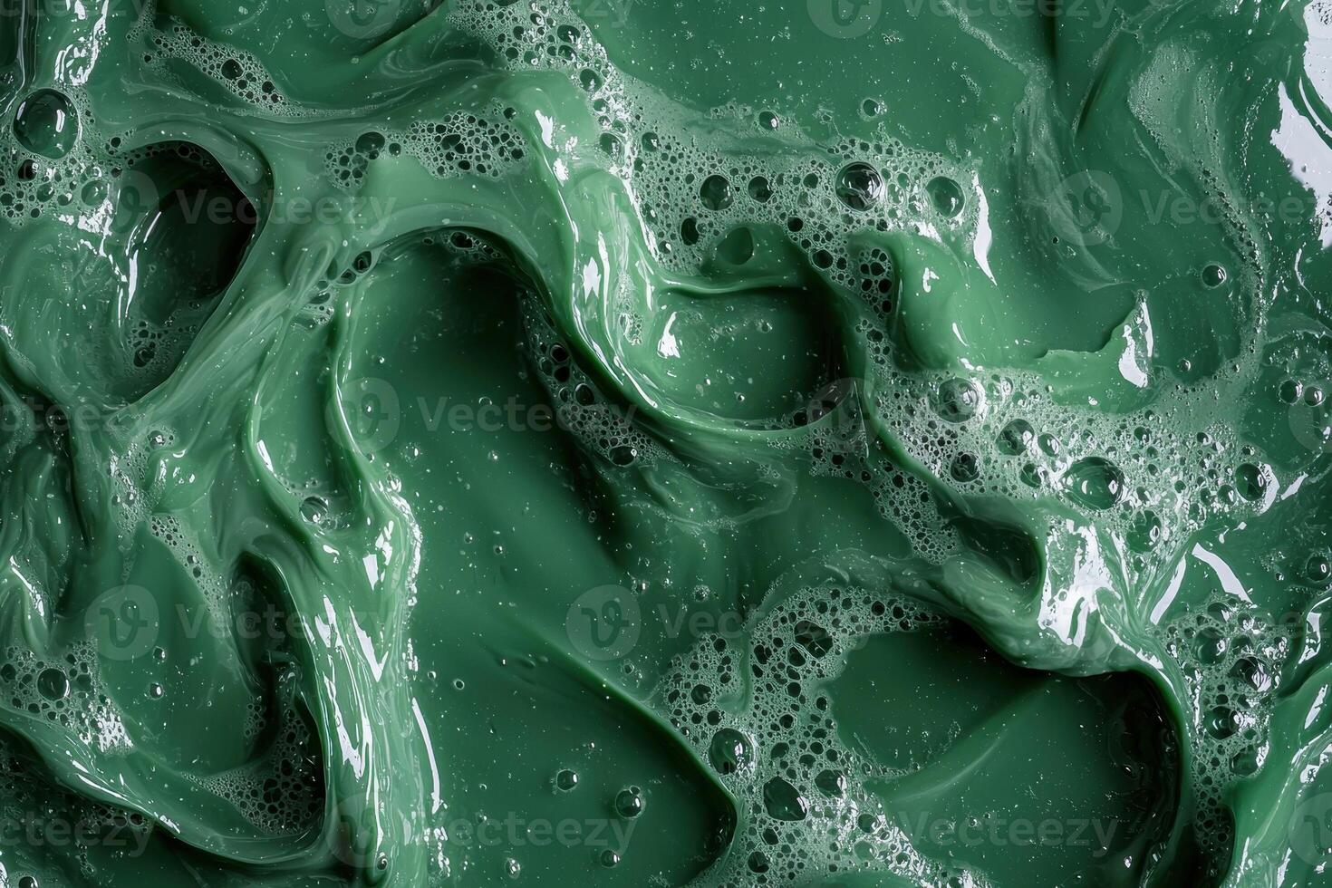 Abstract green liquid with bubbles photo