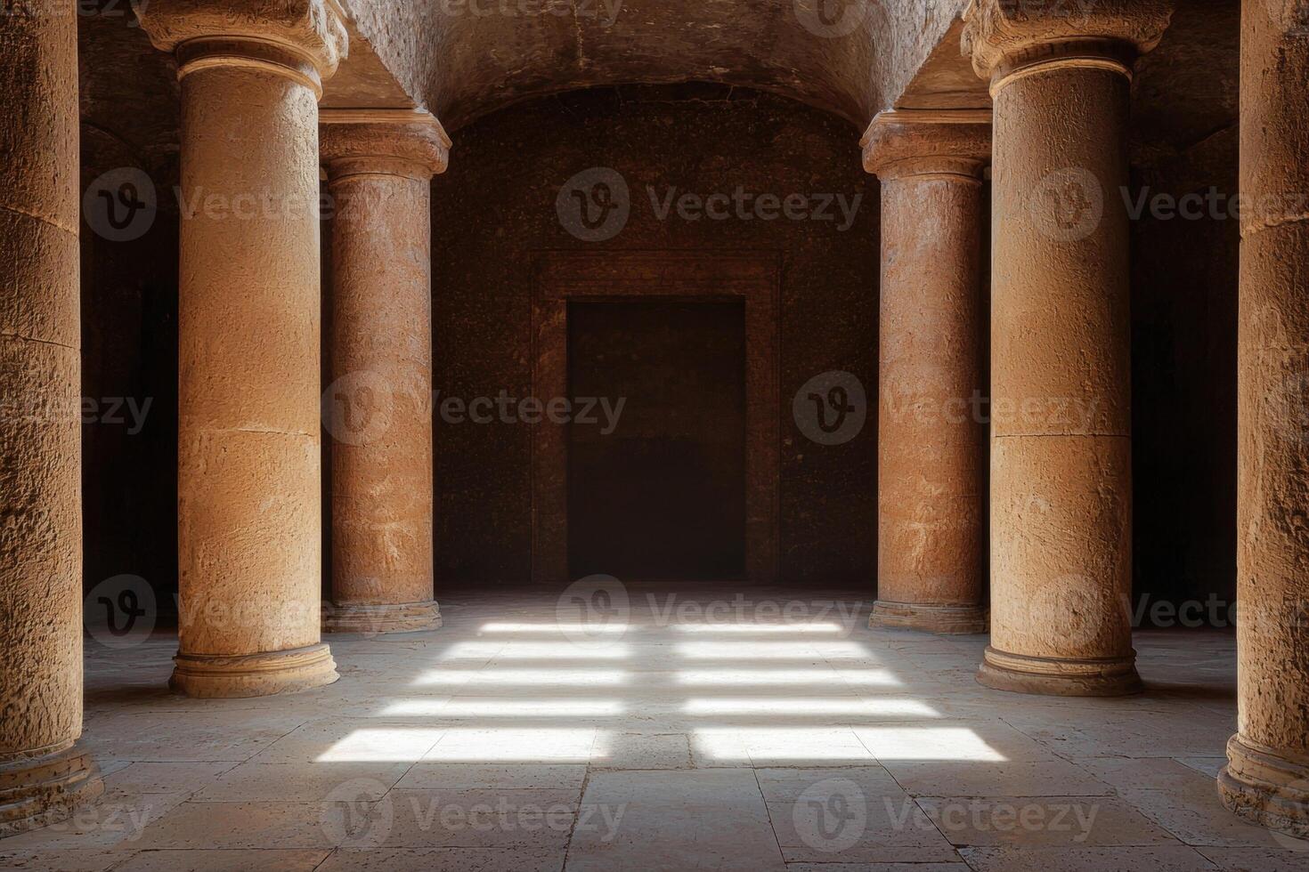 Ancient stone hall with columns and light photo