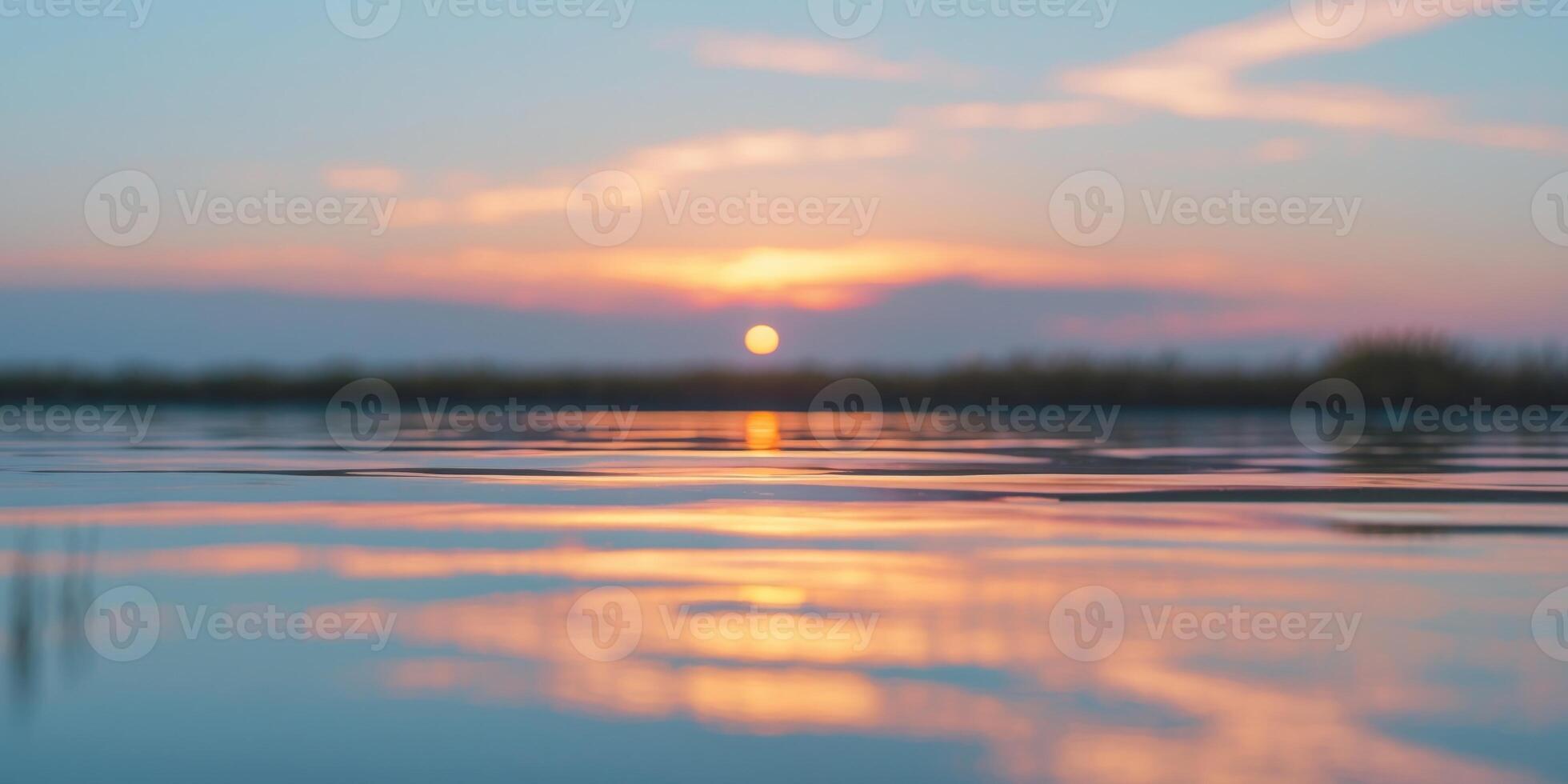 Serene Sunset Reflection on Water Surface photo