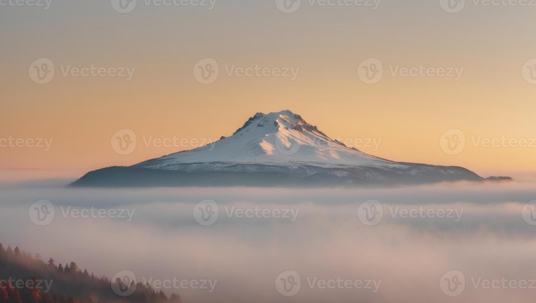 Mount Hood's majestic peak towers over a sea of fog and vibrant autumn colors at sunrise. photo