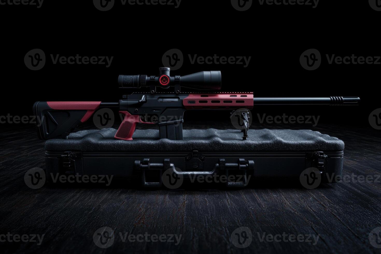 A modern sniper rifle with a red and black finish rests on a hard case photo