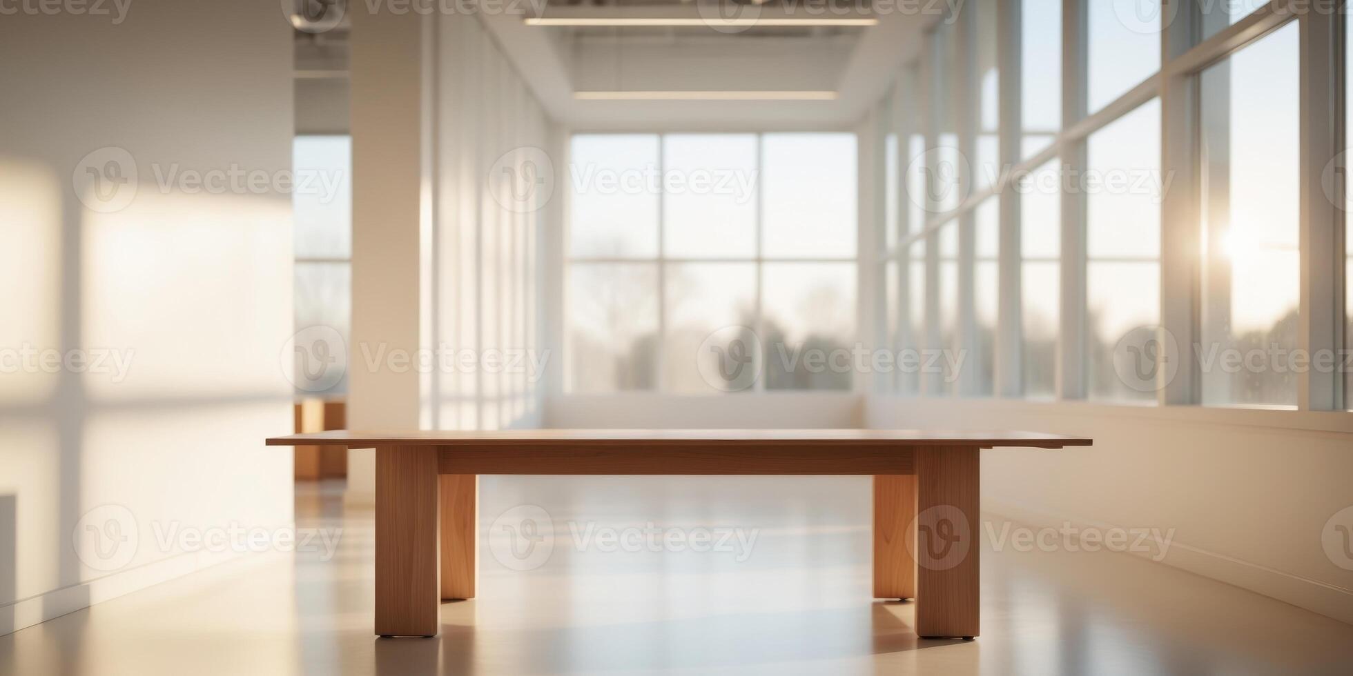 Wooden table in light office with panoramic windows. photo