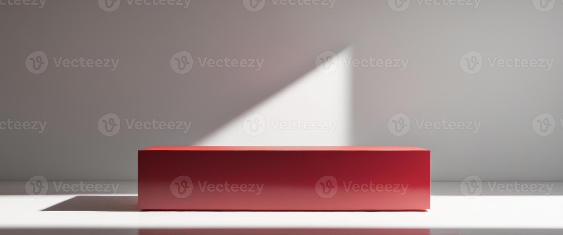 Red podium for product display with spotlight photo