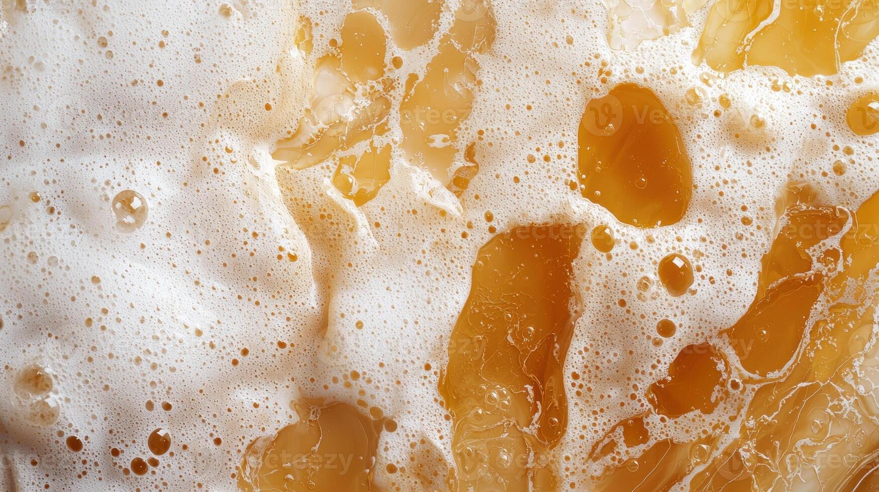 Close up of beer foam and bubbles. photo