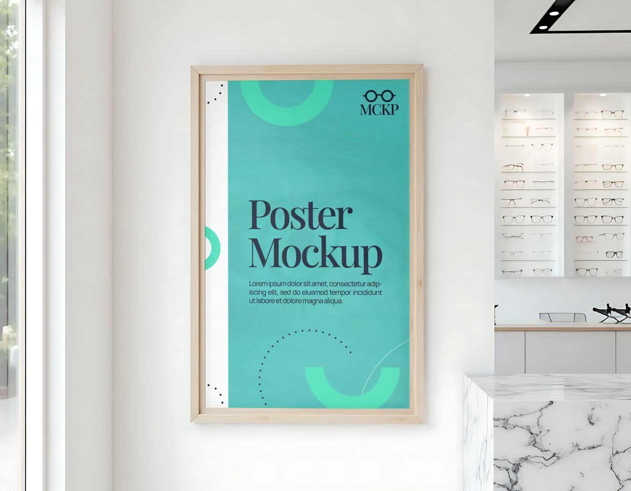 A light teal poster mockup with geometric shapes hangs on a wall inside an optician s office psd