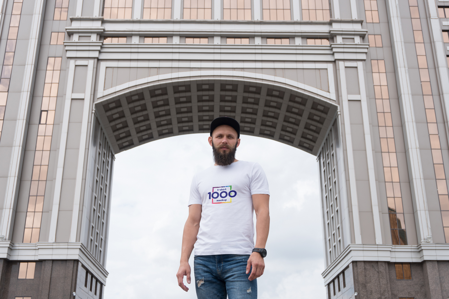 Man in White T-Shirt Standing Under Modern Archway psd