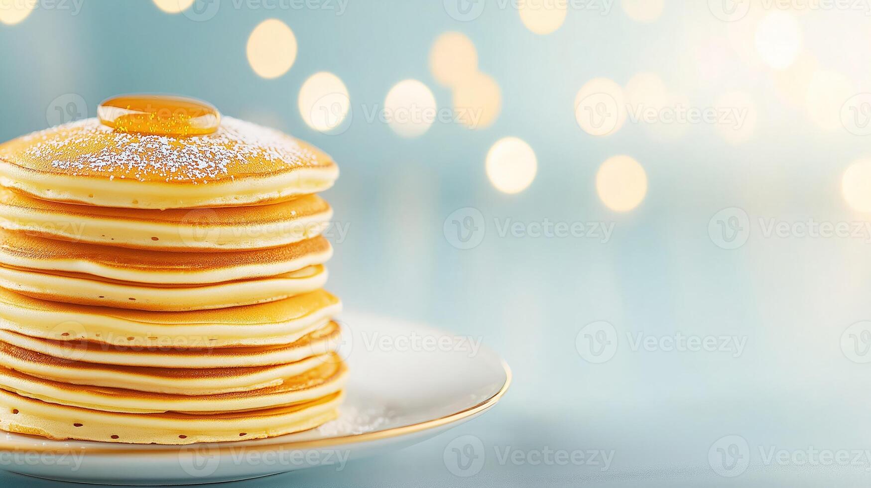 Stack of golden pancakes on white porcelain plate, topped with honey, with copy space photo