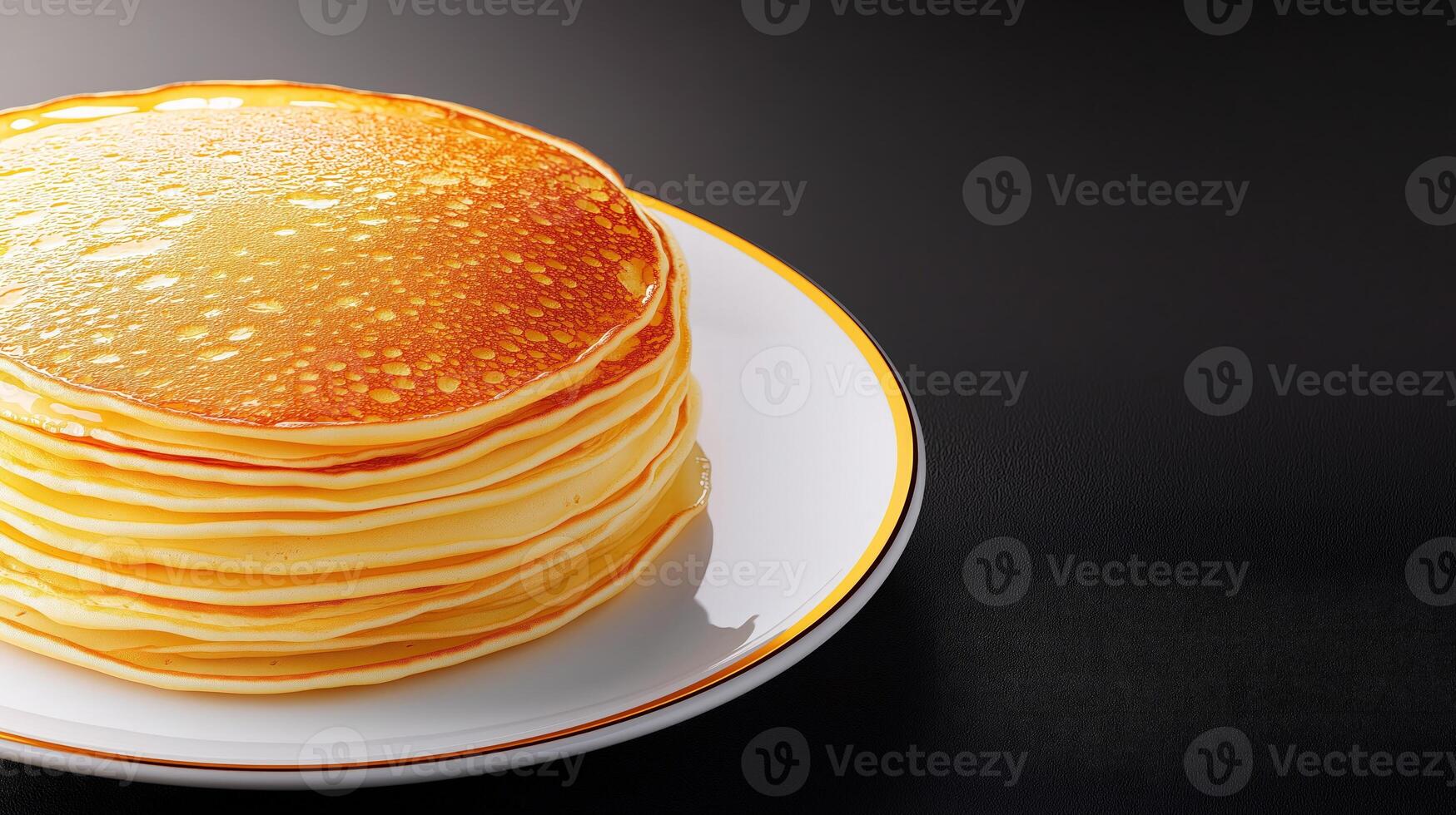 Stack of golden pancakes presented on white porcelain plate on dark surface, with copy space photo