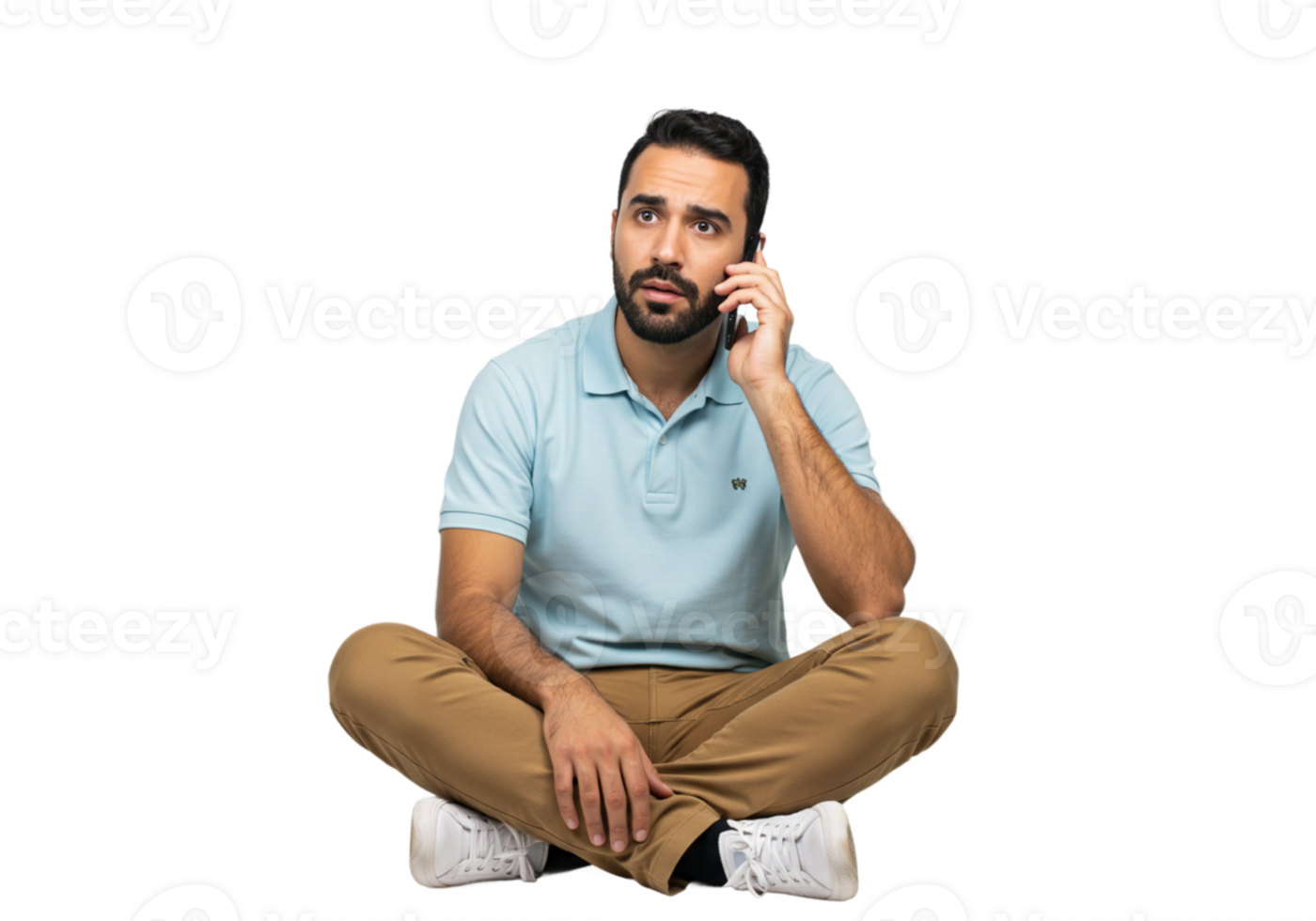 Serious Man on Phone Sitting Cross Legged Casual Style Blue Call Male Shirt Khaki Pants Adult Image png