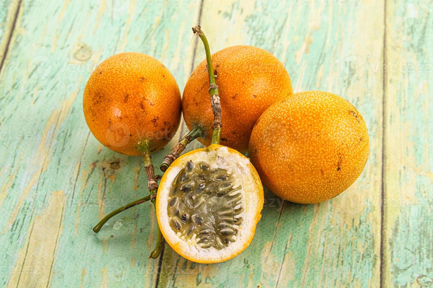 Passion fruit on a wooden table photo