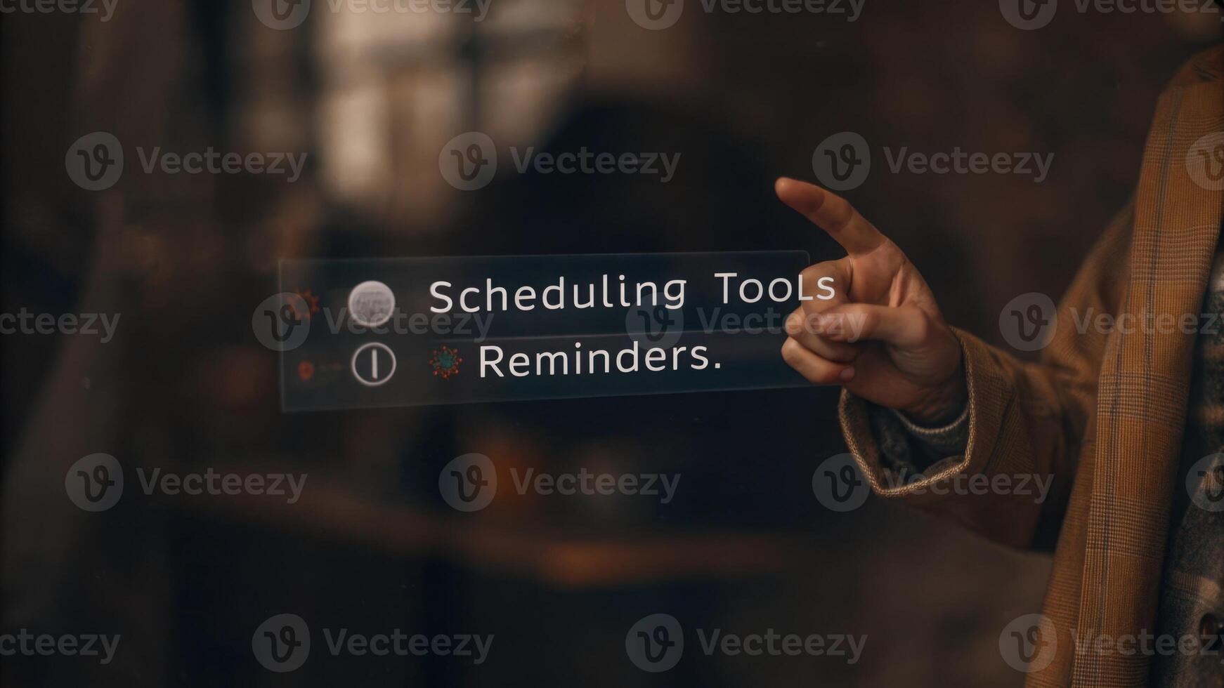 A dynamic closeup of a holographic calendar interface depicting scheduling tools and reminders while a person points to select a date.. photo