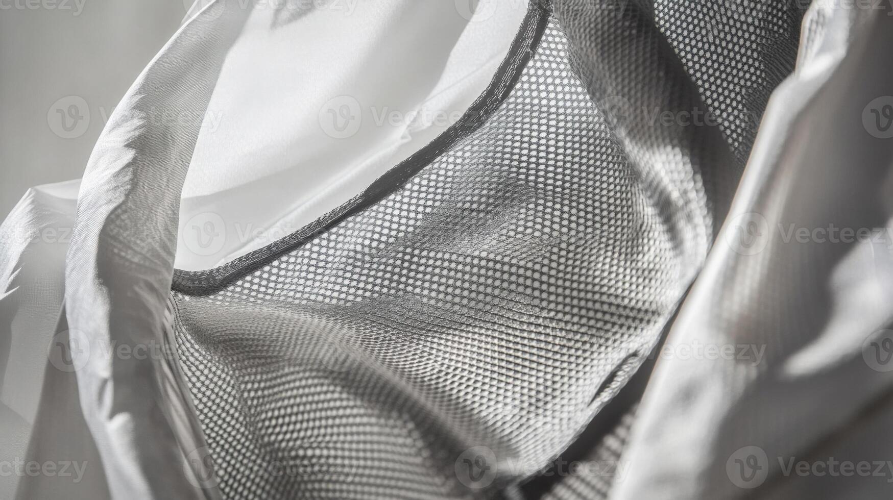 Breathable sportswear fabric featuring mesh for ventilation during exercise photo