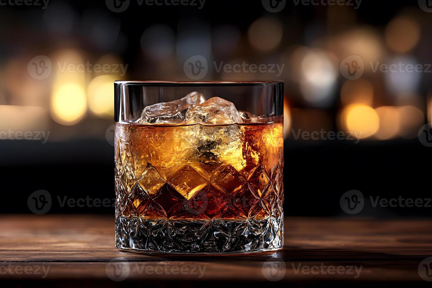 Classic Whiskey Cocktail with Ice in a Crystal Glass for Elegant Gatherings photo