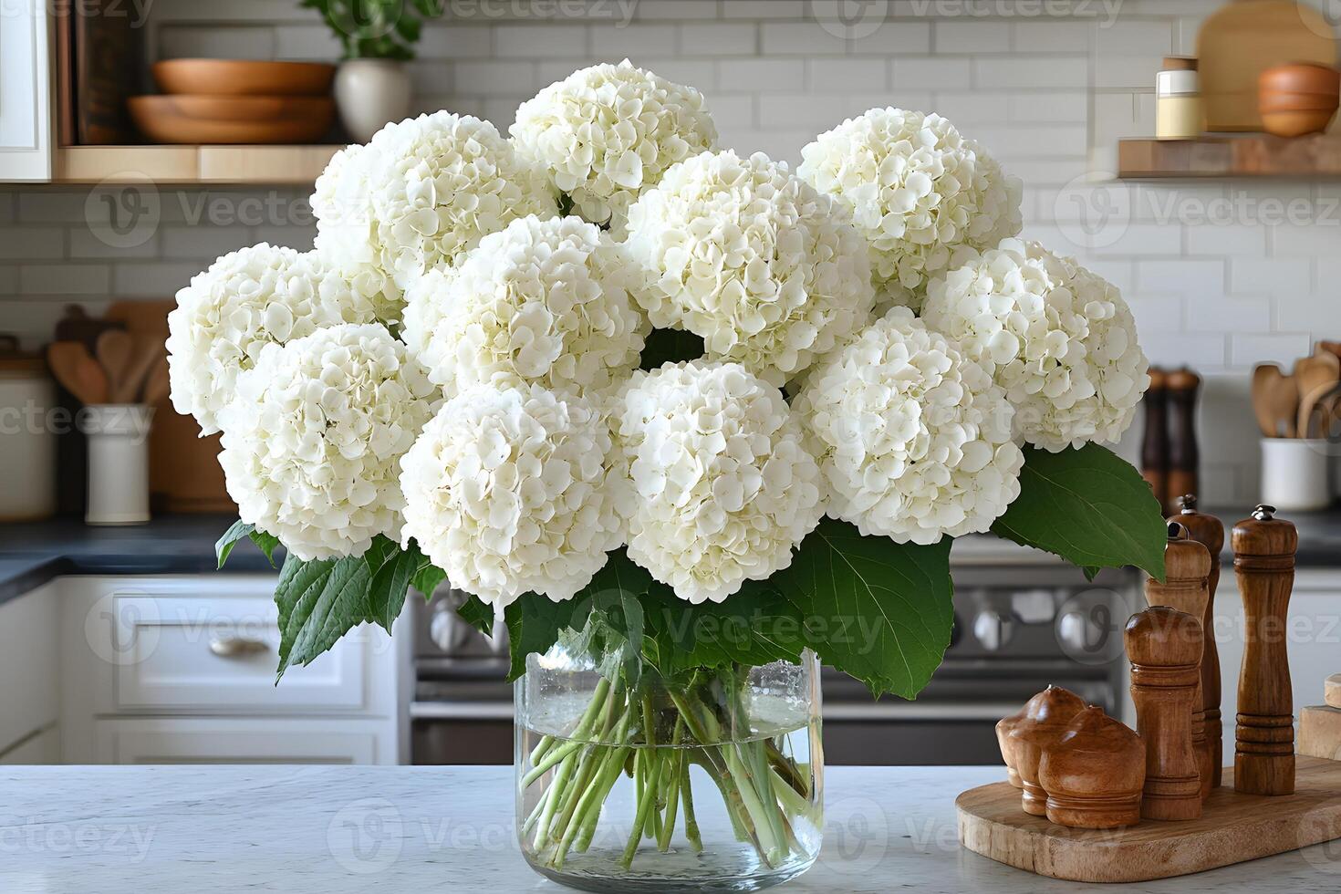 Elegant Kitchen Decor with White Hydrangea Bouquet in Glass Vase photo