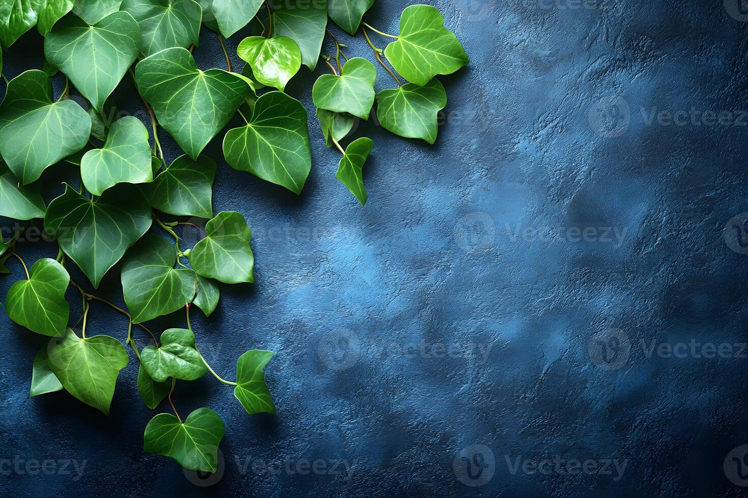 Green Ivy on Textured Blue Wall - Nature-Inspired Background for Modern Interior Design photo