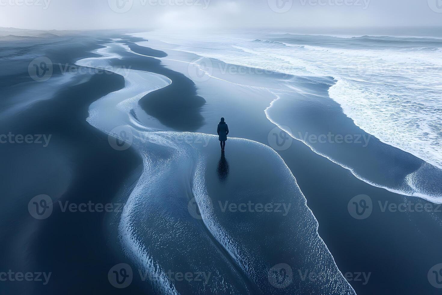Lonely Walk on Misty Beach at Dawn - Serene Coastal Reflection for Tranquil Designs photo