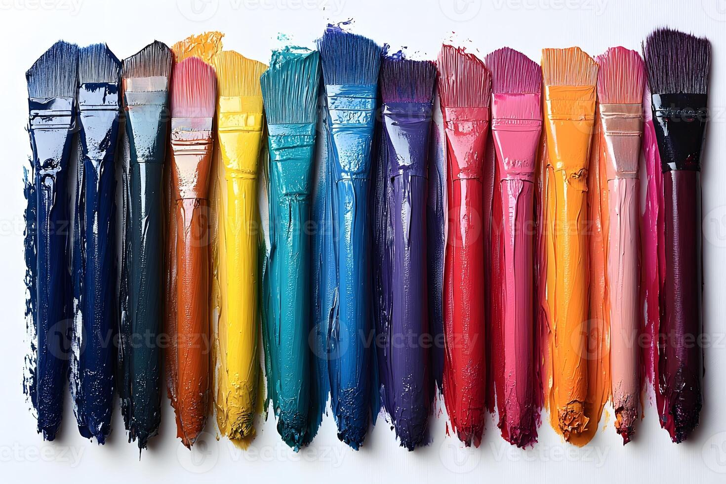 Colorful Spectrum of Paintbrushes with Vibrant Paint for Artistic Creativity photo