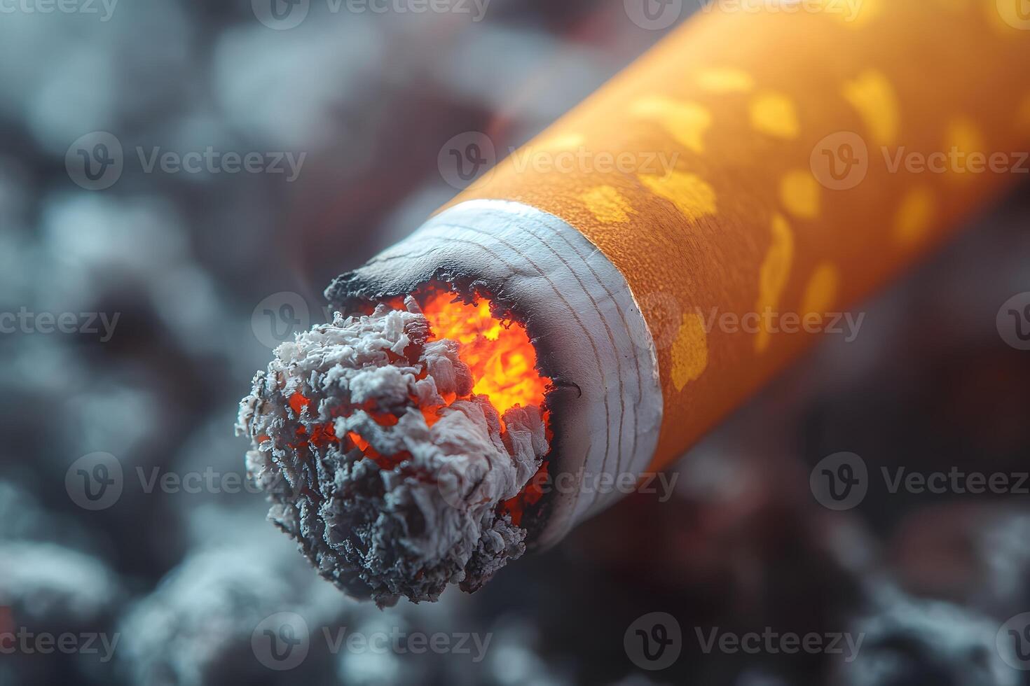 Close-Up of Burning Cigarette with Glowing Embers and Ash photo