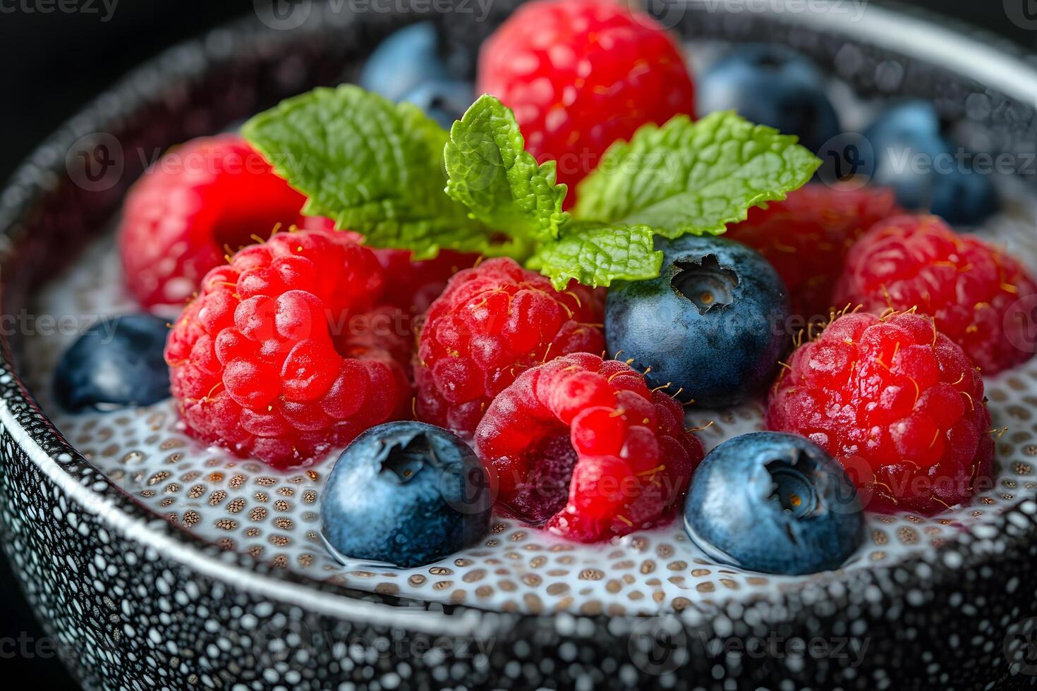 Fresh Berries with Chia Seed Pudding and Mint Garnish for a Nutritious Breakfast photo