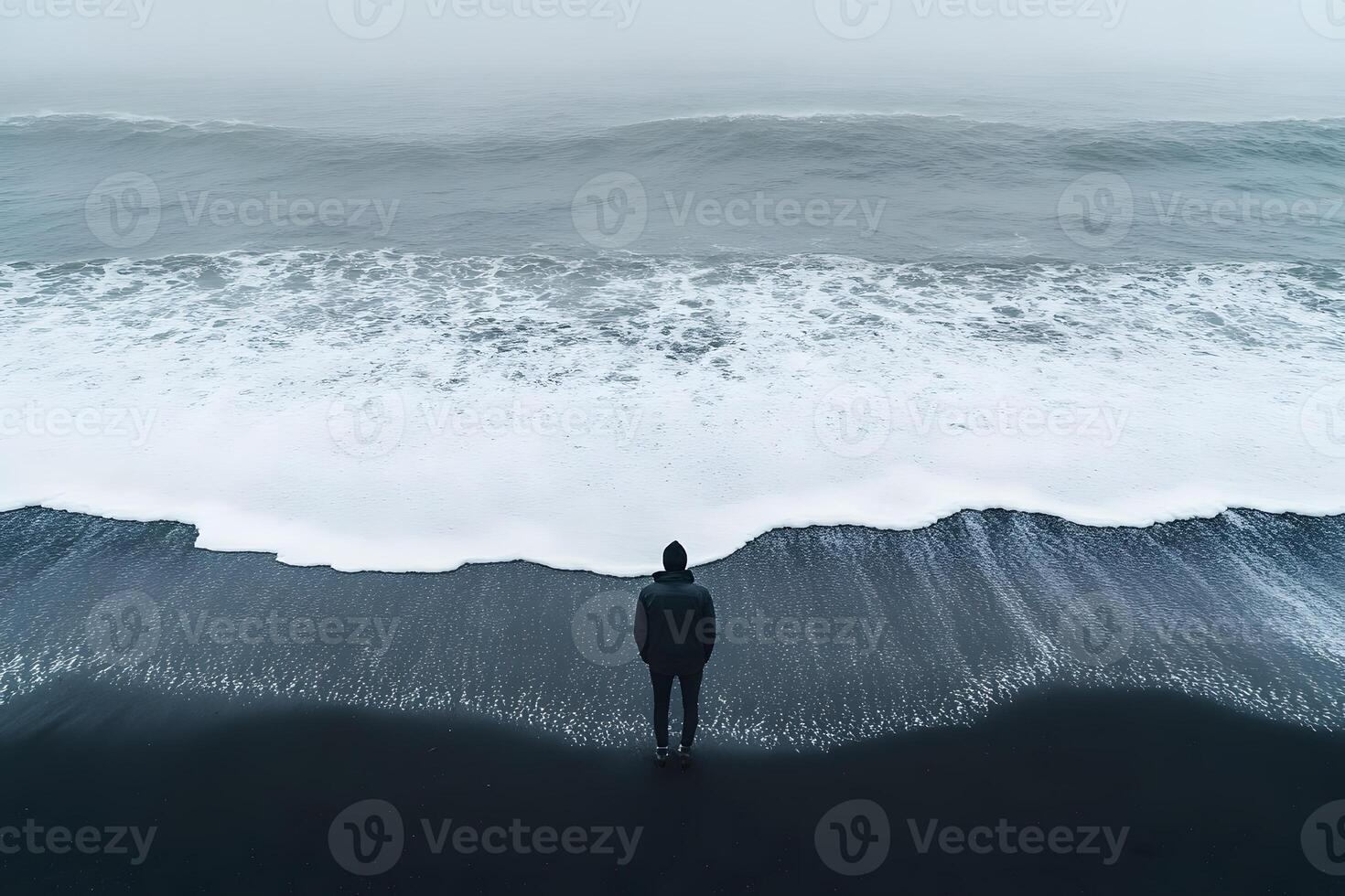 Solitude on Black Sand Beach Contemplative Ocean View for Reflection and Tranquility photo