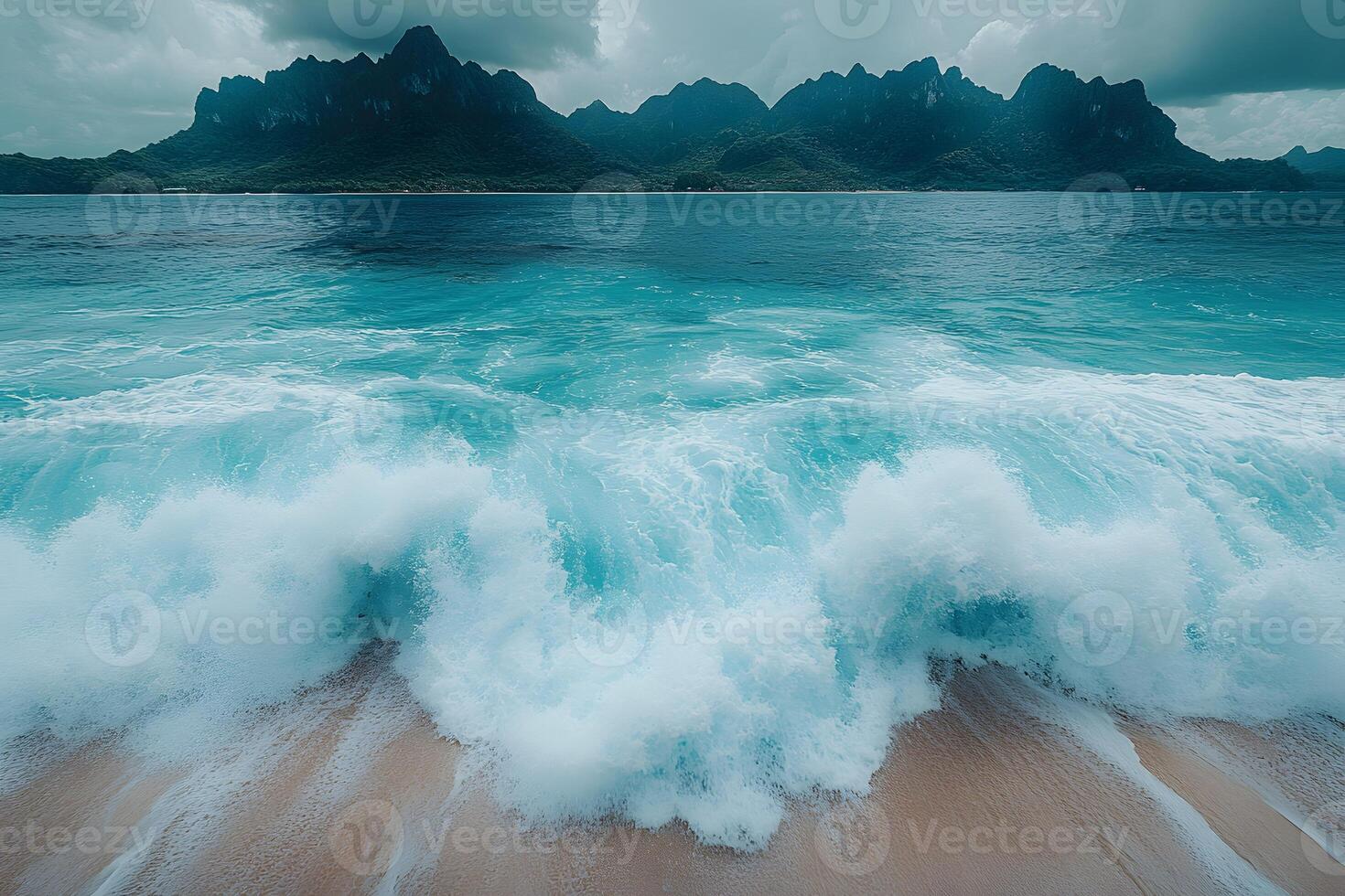 Tranquil Ocean Waves Crashing on Sandy Beach with Mountainous Horizon for Coastal Wall Art Decor photo