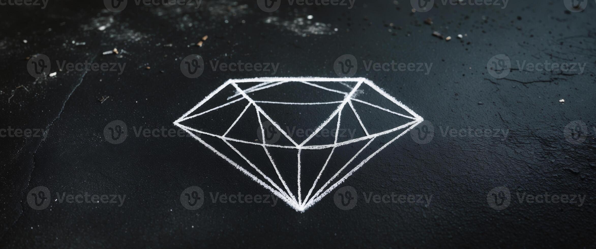 Chalk drawn diamond on a dark textured background surface photo