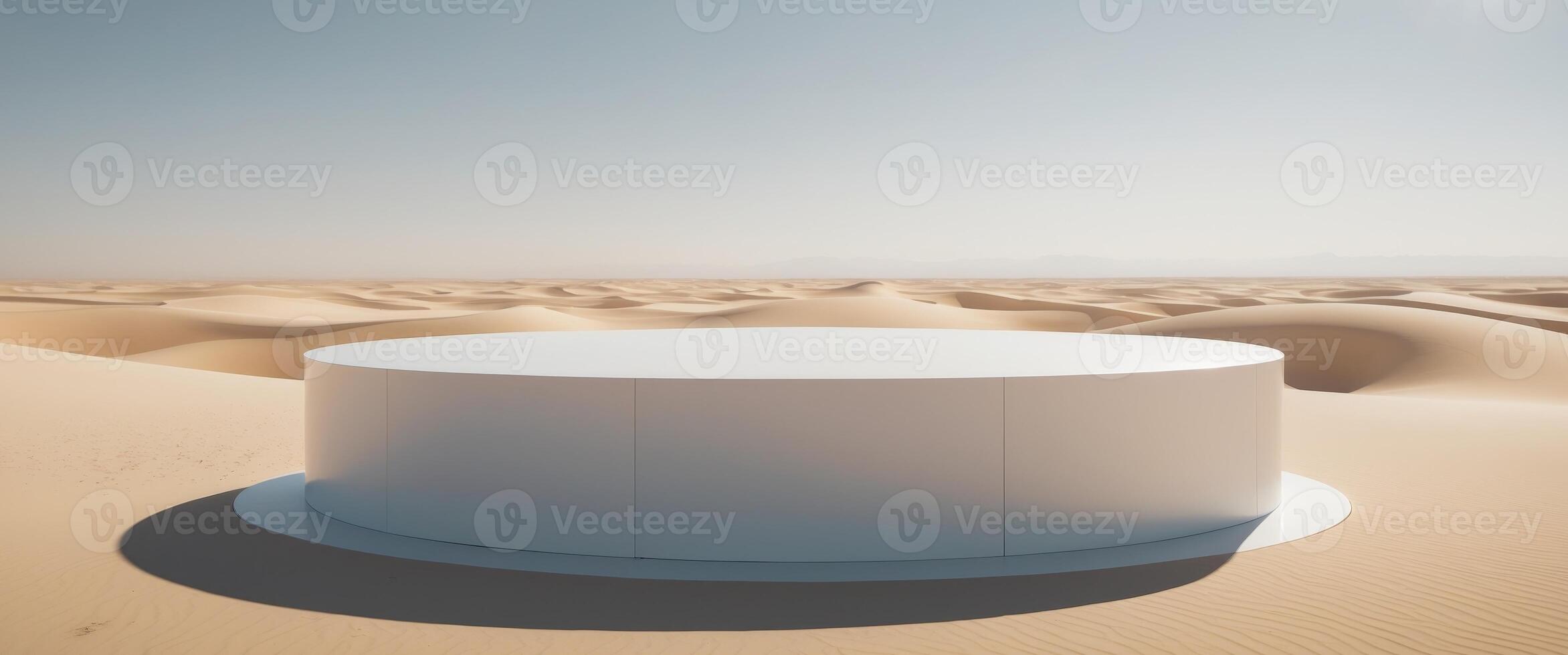 white cylindrical platform in a desert setting. photo