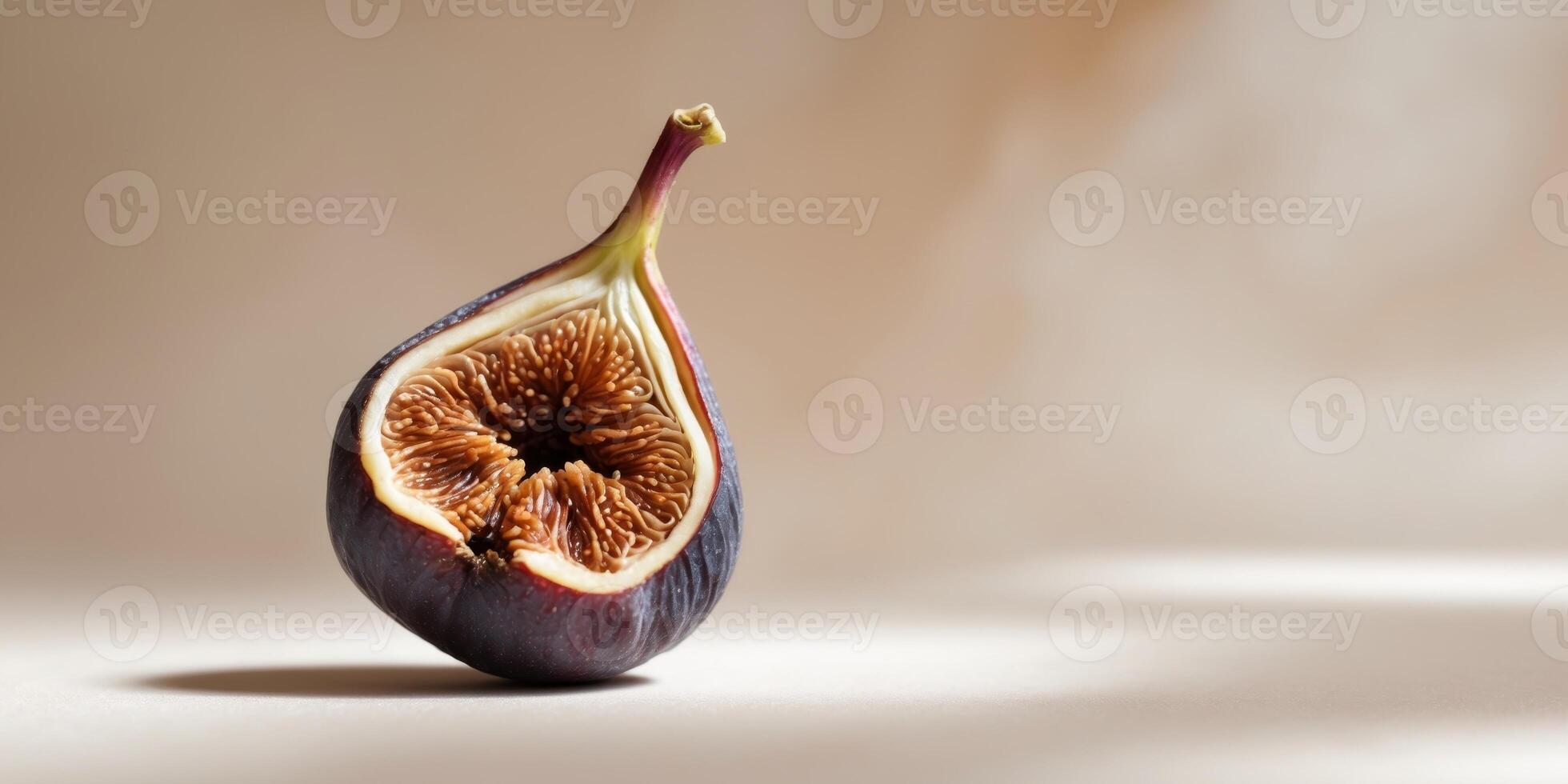 Dried fig half showcasing natural textures on a light beige background. photo
