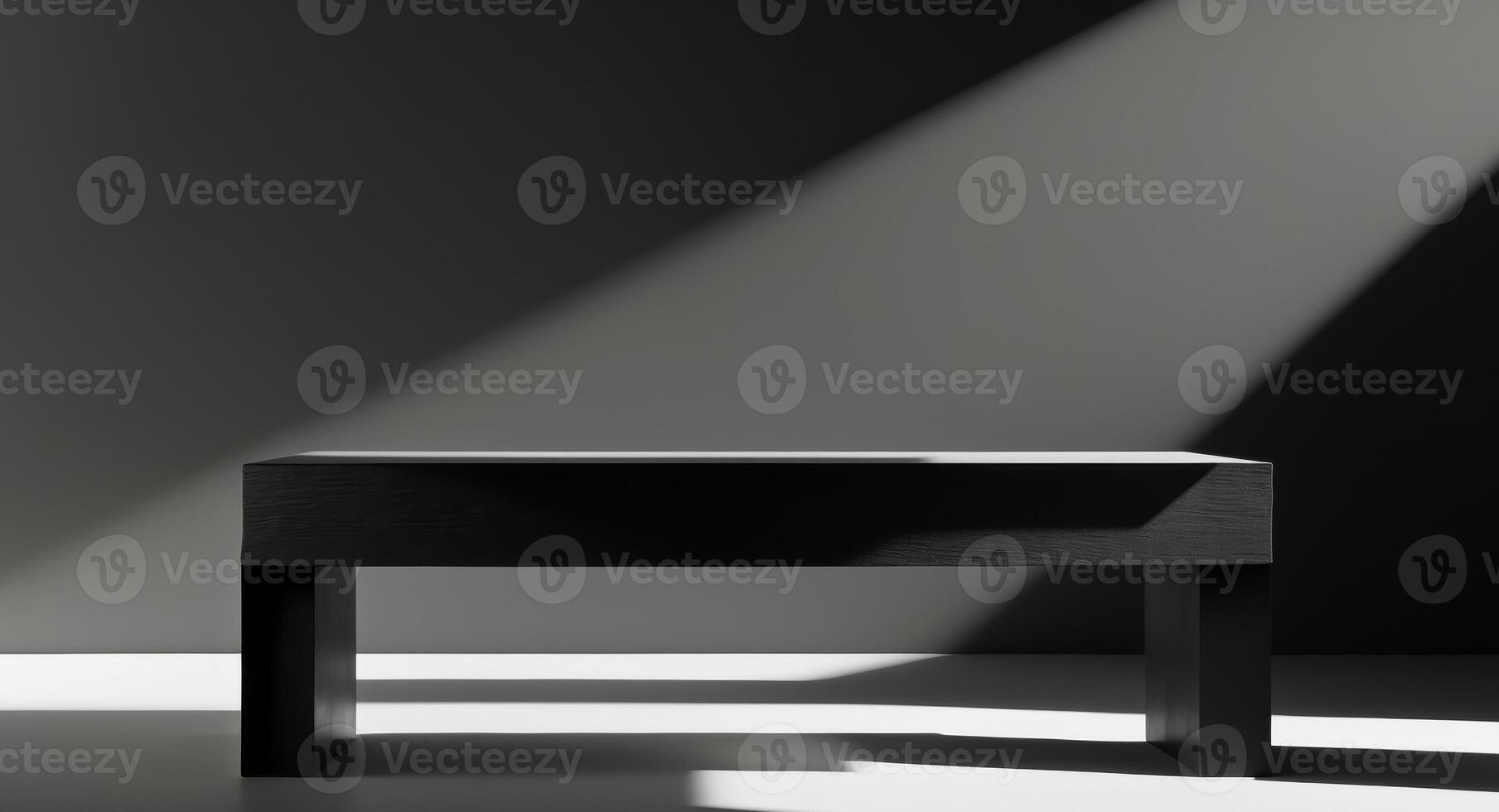 A black background with a black table in the middle photo