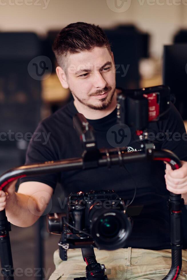 A professional videographer using modern equipment to capture compelling visuals, showcasing expertise and creativity in the art of production. photo