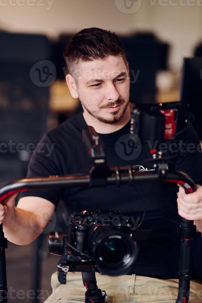 A professional videographer using modern equipment to capture compelling visuals, showcasing expertise and creativity in the art of production. photo