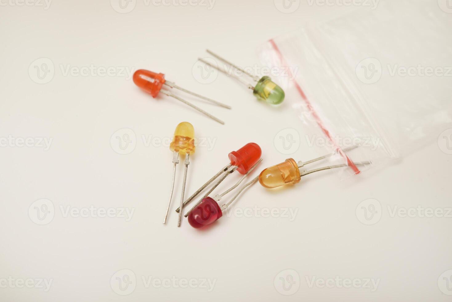 Multi-colored LEDs. Old LEDs on a white background.Red LEDs. photo