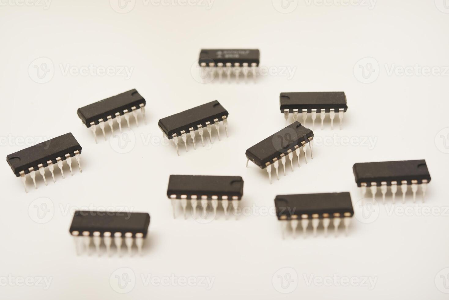 microcontroller on a white background. An electronic chip in a plastic case. photo