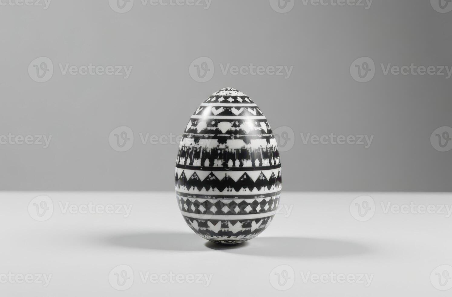 Black and white Easter egg with intricate folk patterns, traditional design photo