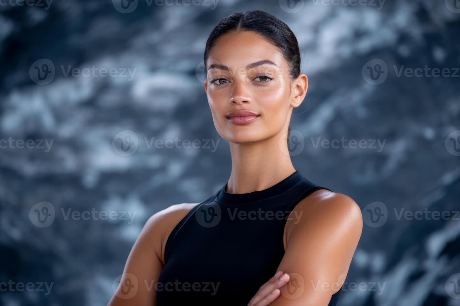 Portrait of a confident woman with a serene expression, showcasing natural beauty and elegance against an artistic backdrop photo